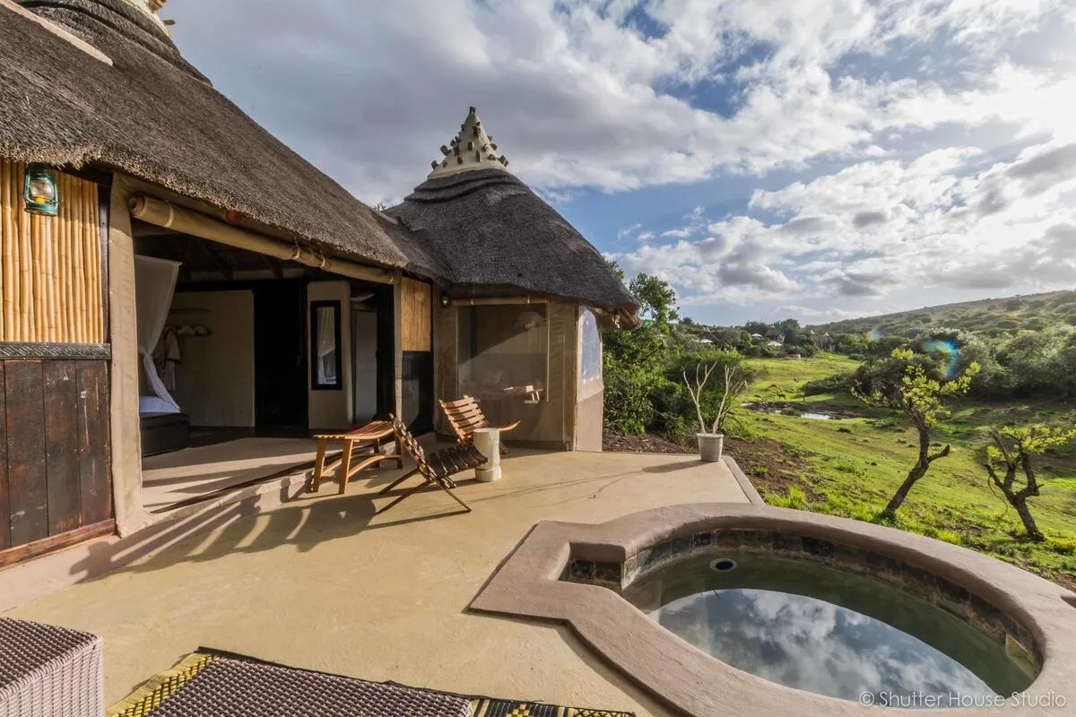 Thatched safari suite with private plunge pool and patio overlooking the bushveld