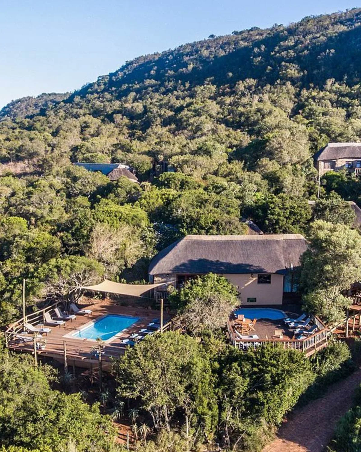 Aerial view of Woodbury Lodge nestled in the bush above the Bushman's River valley